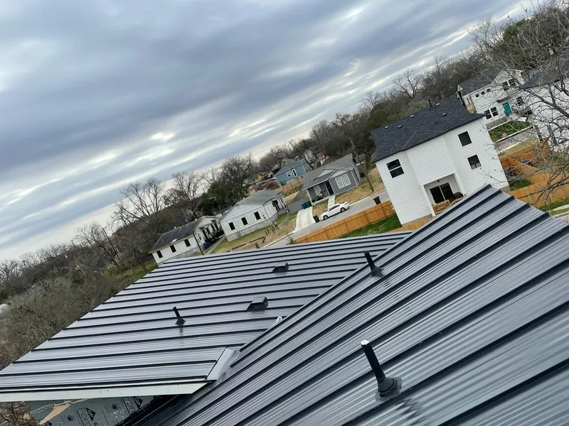 Standing seam metal roof panels with vents for Skylight Repair in Everman